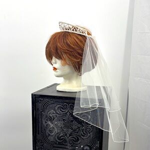 Elegant Pearl Tiara with White Veil